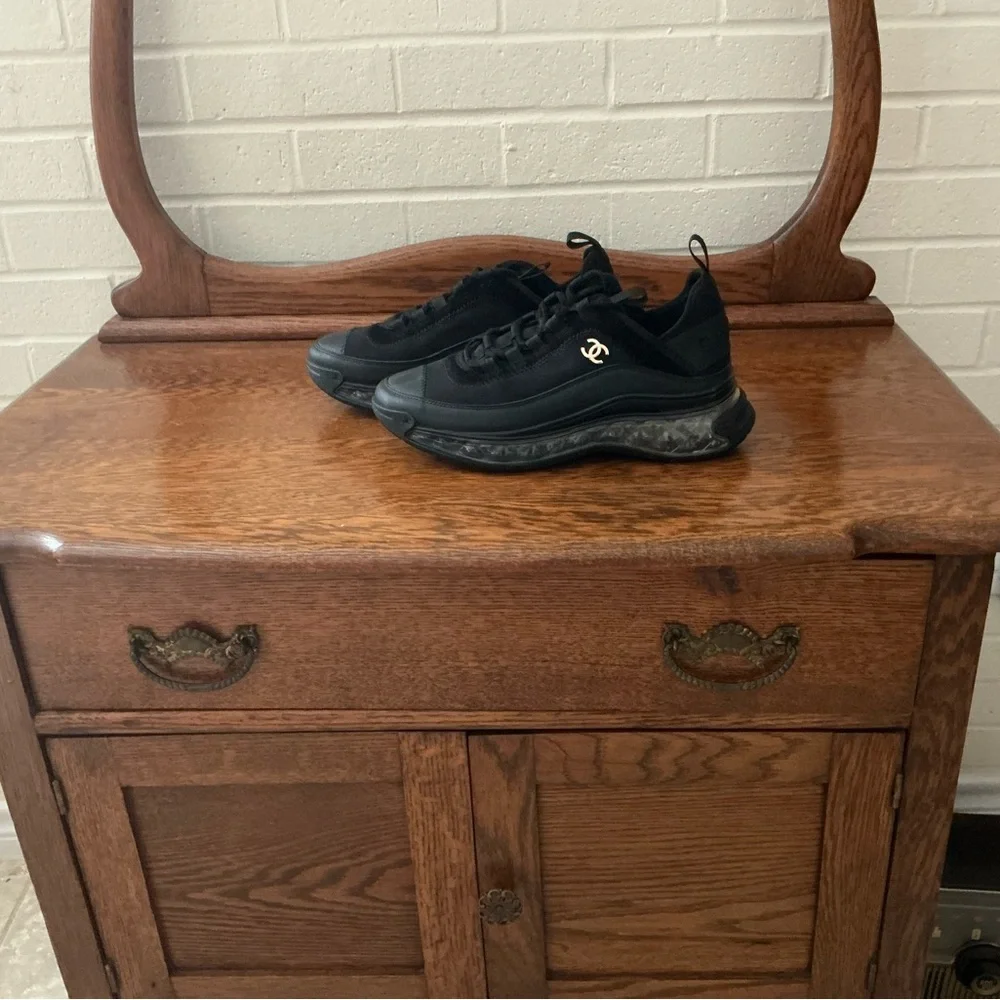 CHANEL Black Women’s Sneakers with Gold Logo